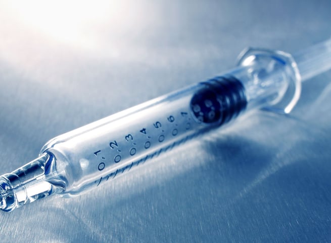 Analysis of protein adsorption to a silicone oil/water interface