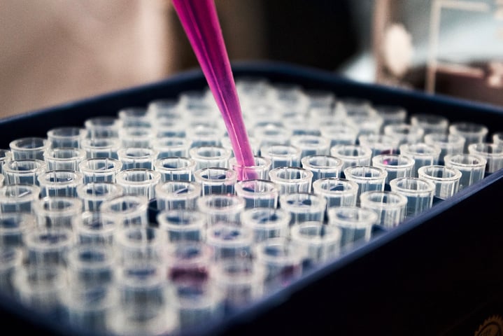 Protein adsorption to glass and plastics